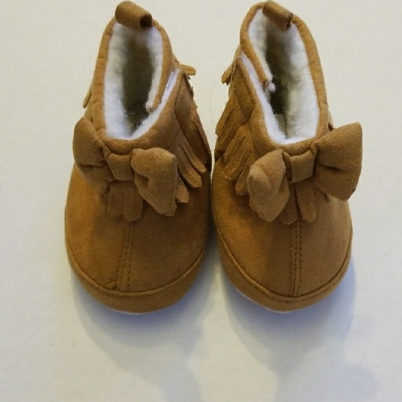 baby shoes with holes